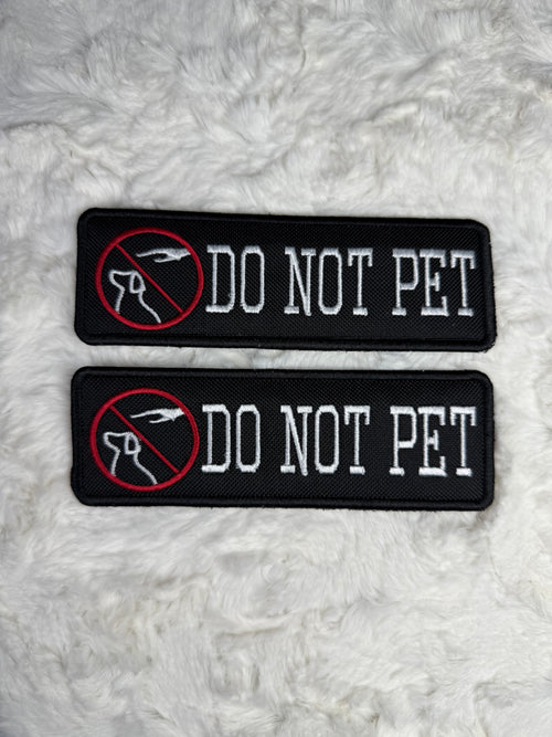 "Do not pet" with symbol